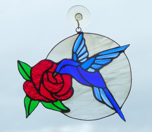 Hummingbird with rose